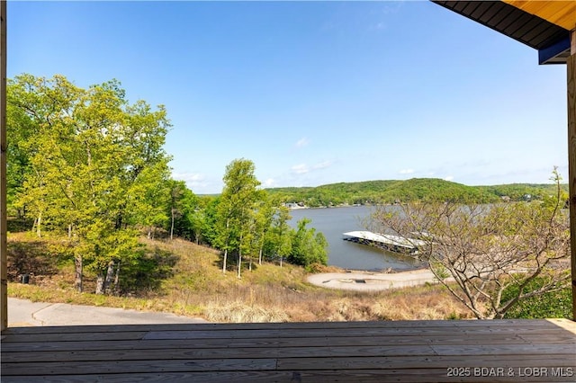 deck featuring a water view