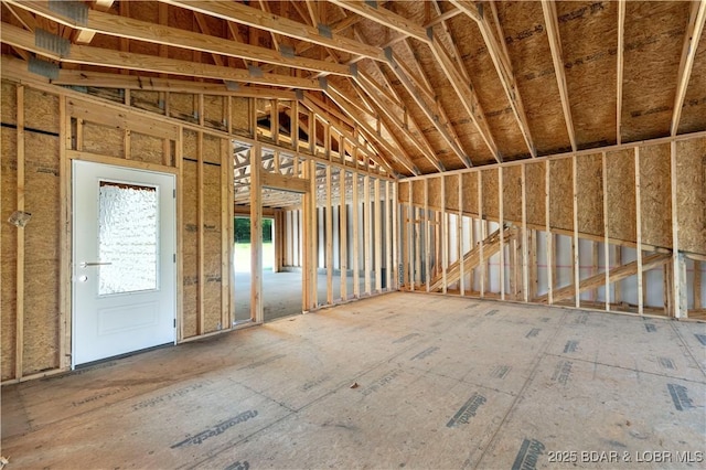 miscellaneous room featuring lofted ceiling