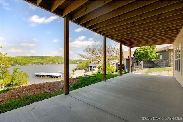 view of patio featuring a water view