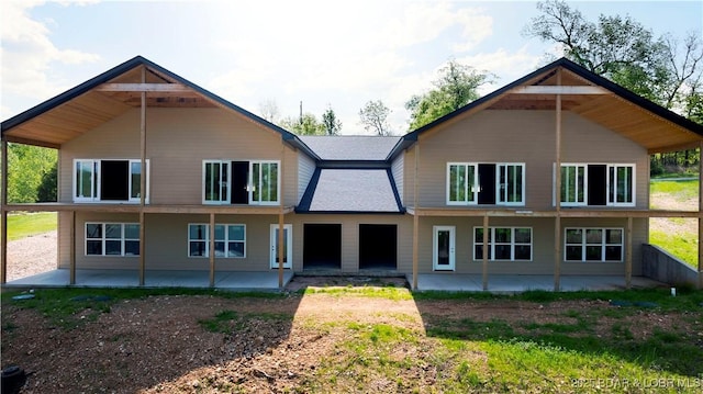 back of house with a patio area