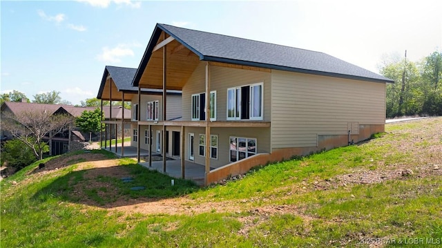 back of property with a patio area