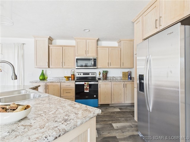 9A Pinkie Ln, Laurie, MO 65037 - kitchen with light countertops, stainless steel appliances, a sink, and light brown cabinets