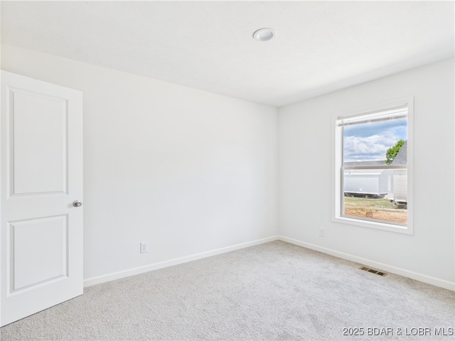 9A Pinkie Ln, Laurie, MO 65037 - carpeted spare room featuring visible vents and baseboards
