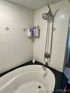 145 Costa Del Sol Dr Unit 2A, Lake Ozark, MO 65049 - bathroom with a bath and a shower