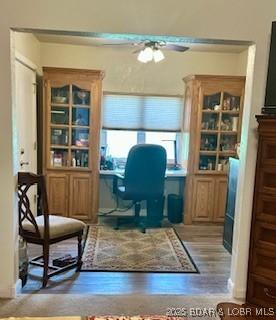 145 Costa Del Sol Dr Unit 2A, Lake Ozark, MO 65049 - home office featuring a ceiling fan and wood finished floors