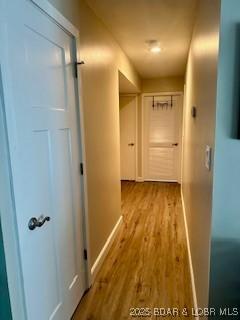 145 Costa Del Sol Dr Unit 2A, Lake Ozark, MO 65049 - corridor featuring wood finished floors