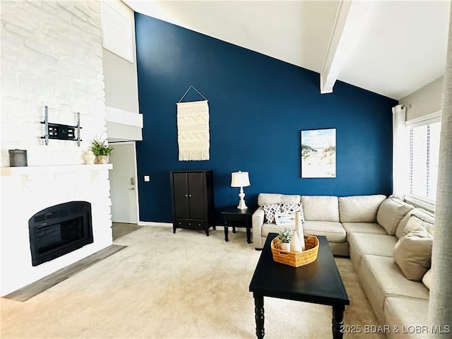 1117 Passover Rd Unit K-8, Osage Beach, MO 65065 - carpeted living room with beamed ceiling, high vaulted ceiling, and a fireplace