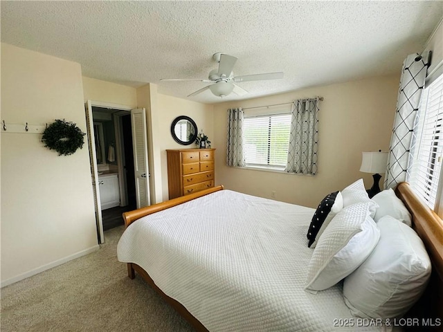 1117 Passover Rd Unit K-8, Osage Beach, MO 65065 - carpeted bedroom with ceiling fan and a textured ceiling
