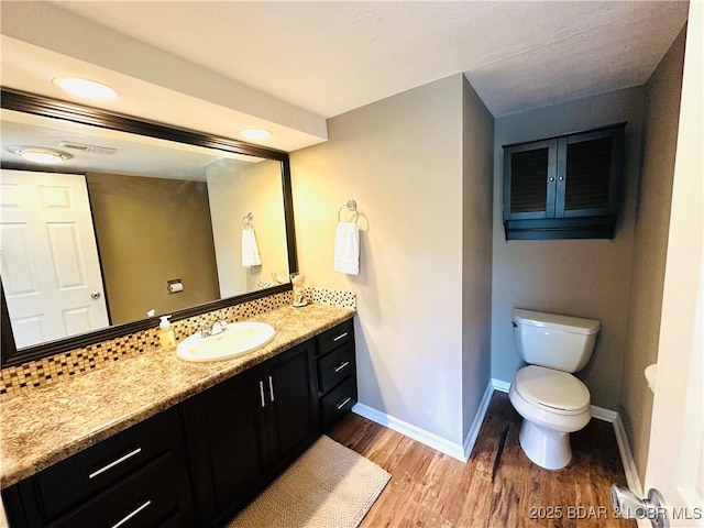 1117 Passover Rd Unit K-8, Osage Beach, MO 65065 - bathroom with wood finished floors and vanity