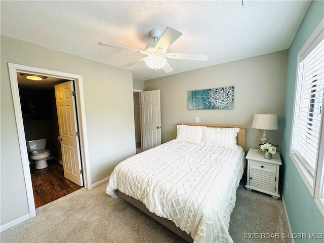 1117 Passover Rd Unit K-8, Osage Beach, MO 65065 - bedroom with carpet flooring, a textured ceiling, and a ceiling fan