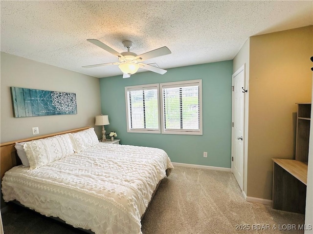 1117 Passover Rd Unit K-8, Osage Beach, MO 65065 - carpeted bedroom featuring a textured ceiling and a ceiling fan