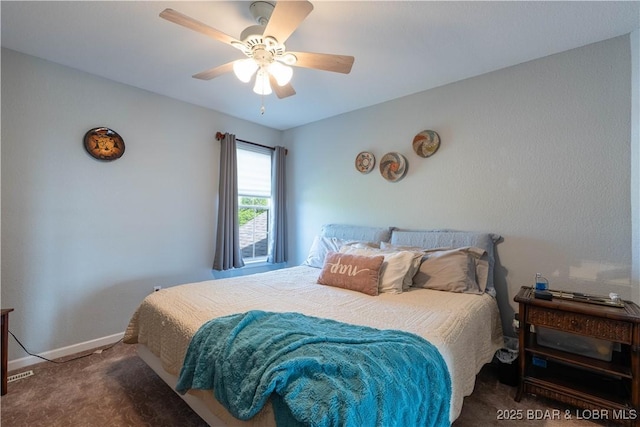 bedroom with baseboards, ceiling fan, and carpet flooring