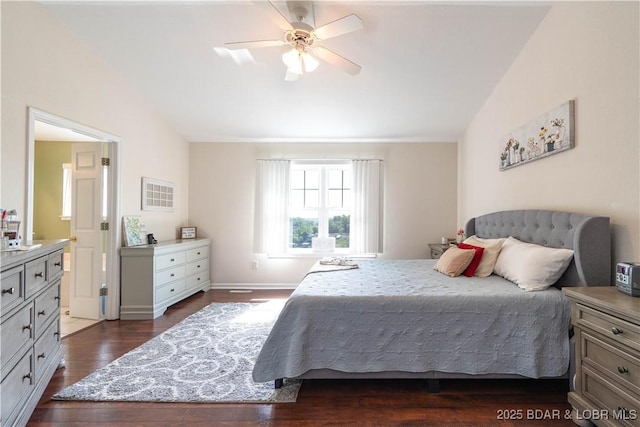 bedroom featuring baseboards, a ceiling fan, dark wood-type flooring, and lofted ceiling
