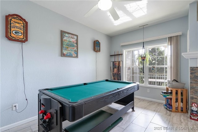 rec room with ceiling fan, billiards, and baseboards