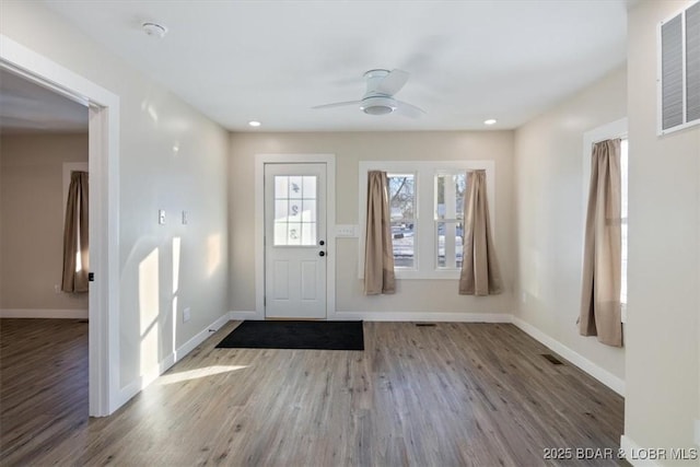 421 W High St, Eldon, MO 65026 - entrance foyer with wood finished floors, baseboards, ceiling fan, and recessed lighting