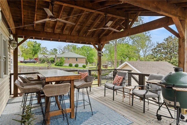 20168 Lost Valley Rd, Warsaw, MO 65355 - wooden terrace with ceiling fan and grilling area