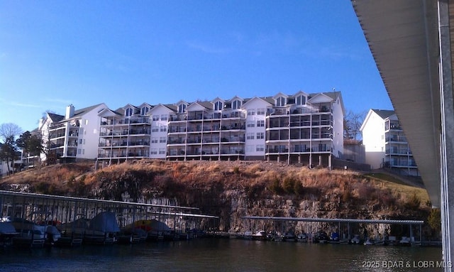view of building exterior featuring a water view