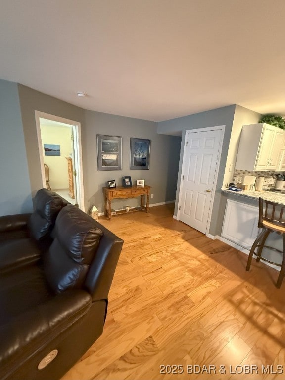 living area featuring light wood-style flooring
