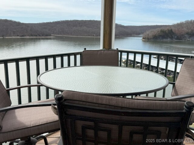 194 Park Place Ln Unit 3G, Kaiser, MO 65047 - balcony featuring a water view and outdoor dining area