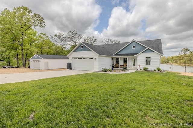 view of front of home with a garage, a front lawn, roof with shingles, a porch, and driveway