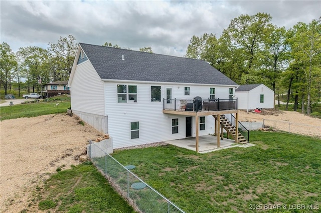 back of house featuring fence private yard, stairs, a patio area, and a deck