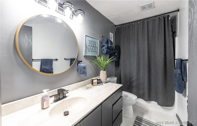 full bath with toilet, vanity, a textured ceiling, visible vents, and tile patterned flooring