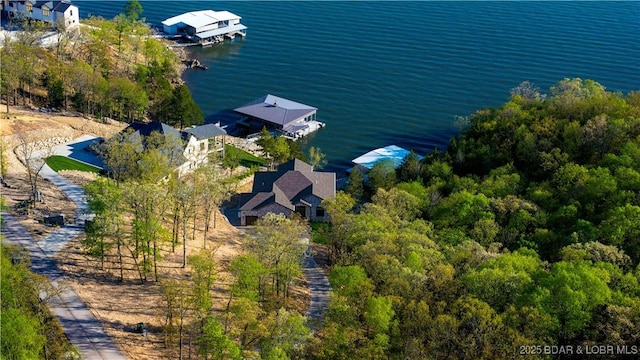 birds eye view of property featuring a water view