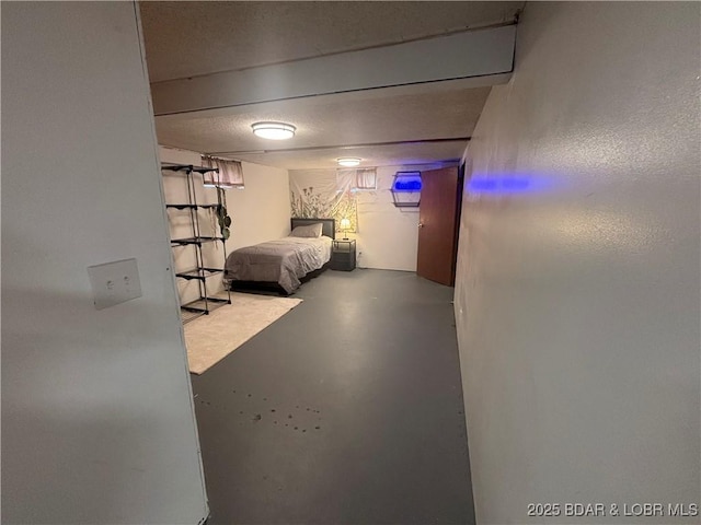 bedroom with finished concrete floors