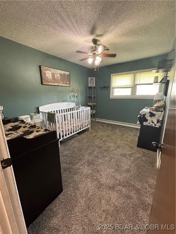 bedroom featuring dark colored carpet, ceiling fan, and a textured ceiling