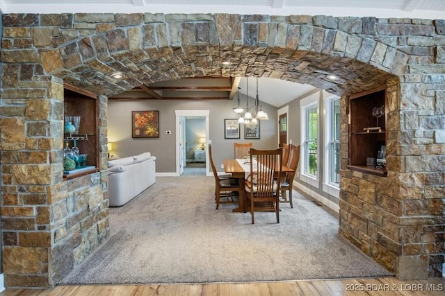 649 Nichol Rd, Edwards, MO 65326 - dining space featuring vaulted ceiling, an inviting chandelier, baseboards, and wood finished floors