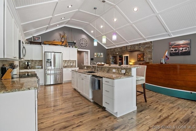 649 Nichol Rd, Edwards, MO 65326 - kitchen with a sink, white cabinets, light wood-type flooring, and appliances with stainless steel finishes