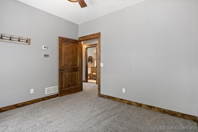 649 Nichol Rd, Edwards, MO 65326 - spare room featuring a ceiling fan, baseboards, visible vents, and carpet