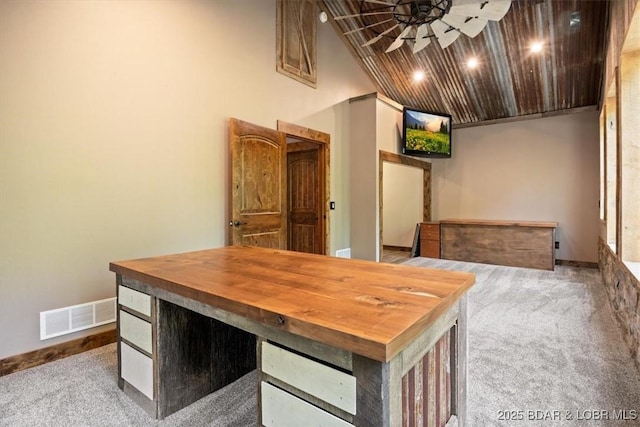 649 Nichol Rd, Edwards, MO 65326 - office area featuring baseboards, carpet flooring, ceiling fan, visible vents, and high vaulted ceiling