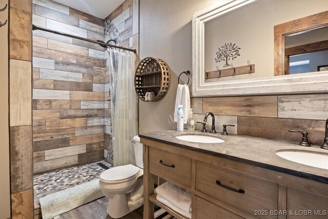 649 Nichol Rd, Edwards, MO 65326 - full bath with a sink, toilet, and a tile shower