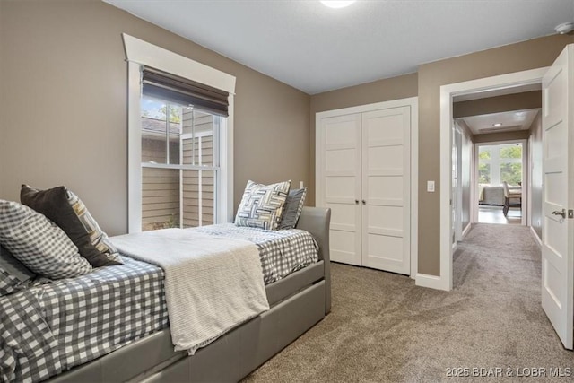 649 Nichol Rd, Edwards, MO 65326 - carpeted bedroom with a closet and baseboards