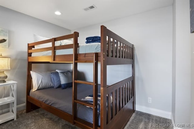bedroom featuring carpet, visible vents, and baseboards