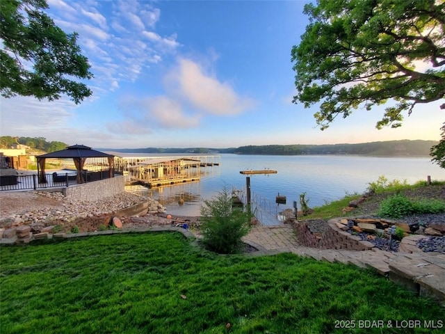 property view of water with a gazebo