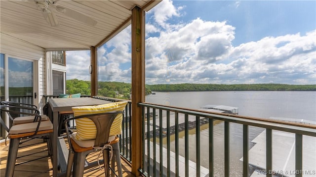 balcony featuring a water view