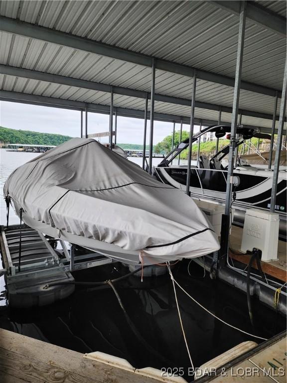 194 Park Place Ln Unit 3C, Kaiser, MO 65047 - dock area with boat lift and a water view