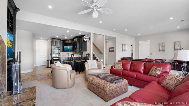 207 Buck Deer Ln, Camdenton, MO 65020 - living area with ceiling fan, stairs, visible vents, and recessed lighting