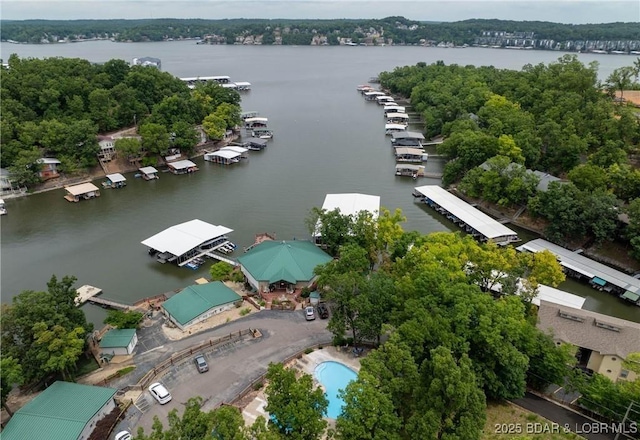 bird's eye view with a water view
