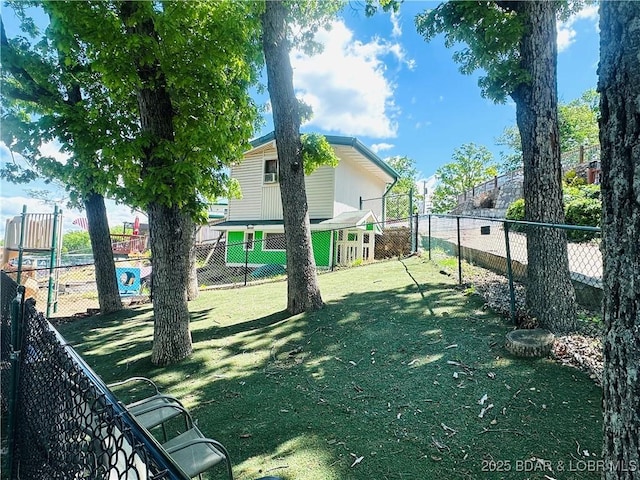 view of yard with a fenced backyard