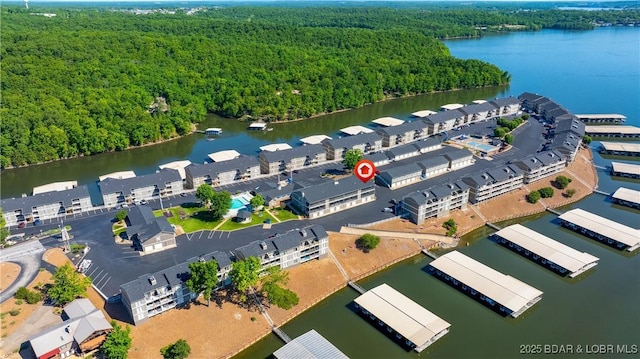 611 Lazy Days Rd Unit L5, Osage Beach, MO 65065 - drone / aerial view featuring a wooded view and a water view
