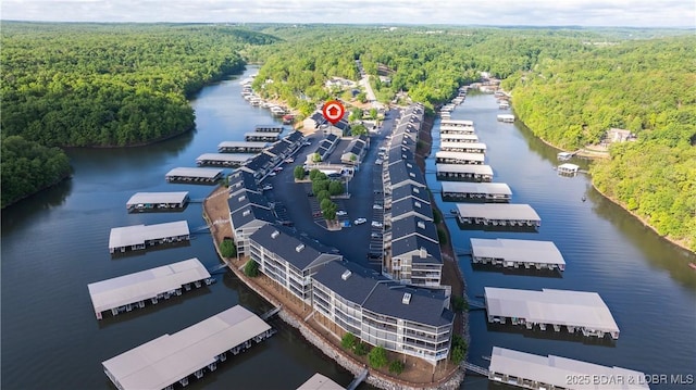 611 Lazy Days Rd Unit L5, Osage Beach, MO 65065 - drone / aerial view featuring a water view and a forest view