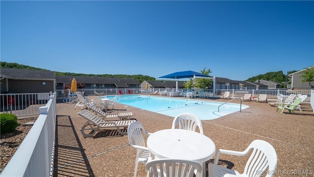 611 Lazy Days Rd Unit L5, Osage Beach, MO 65065 - pool featuring a patio area and fence