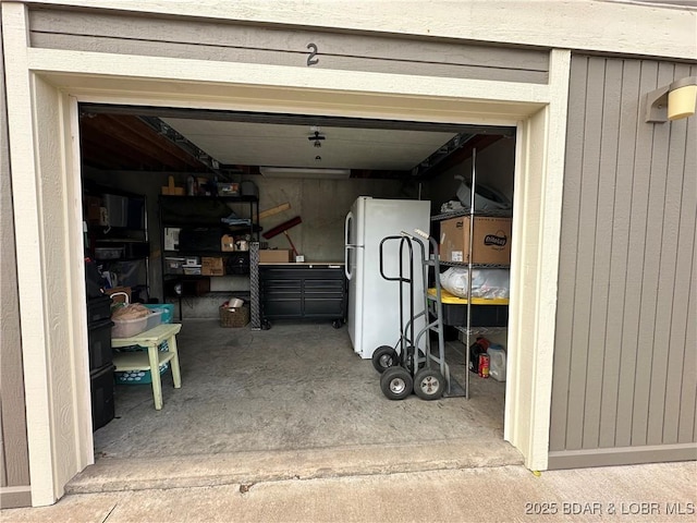 611 Lazy Days Rd Unit L5, Osage Beach, MO 65065 - garage with freestanding refrigerator