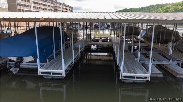 611 Lazy Days Rd Unit L5, Osage Beach, MO 65065 - view of dock featuring a water view and boat lift