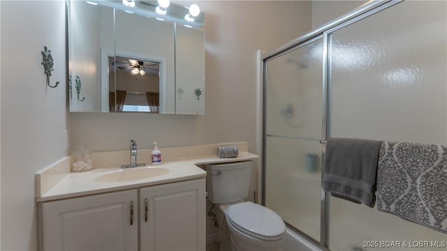 611 Lazy Days Rd Unit L5, Osage Beach, MO 65065 - full bath featuring a stall shower, vanity, toilet, and ceiling fan