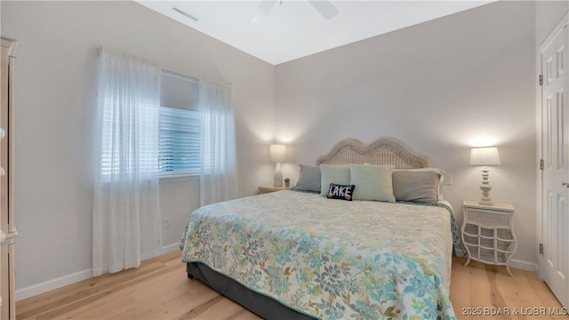 611 Lazy Days Rd Unit L5, Osage Beach, MO 65065 - bedroom featuring visible vents, wood finished floors, baseboards, and ceiling fan