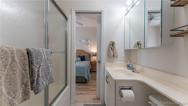 611 Lazy Days Rd Unit L5, Osage Beach, MO 65065 - ensuite bathroom with enclosed tub / shower combo, ensuite bath, and vanity